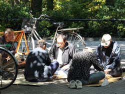 Homeless playing draughts in the park